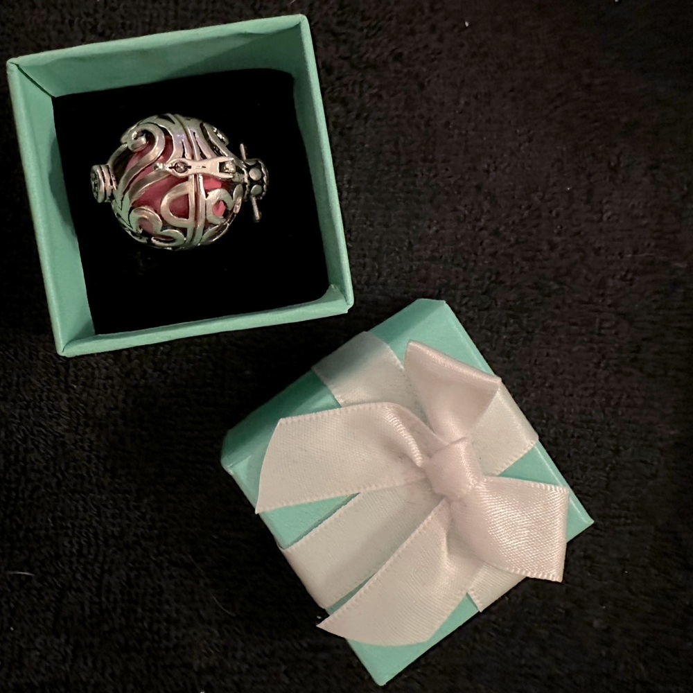 Filigree Sterling Silver Cage with Pink Harmony Ball Pendant